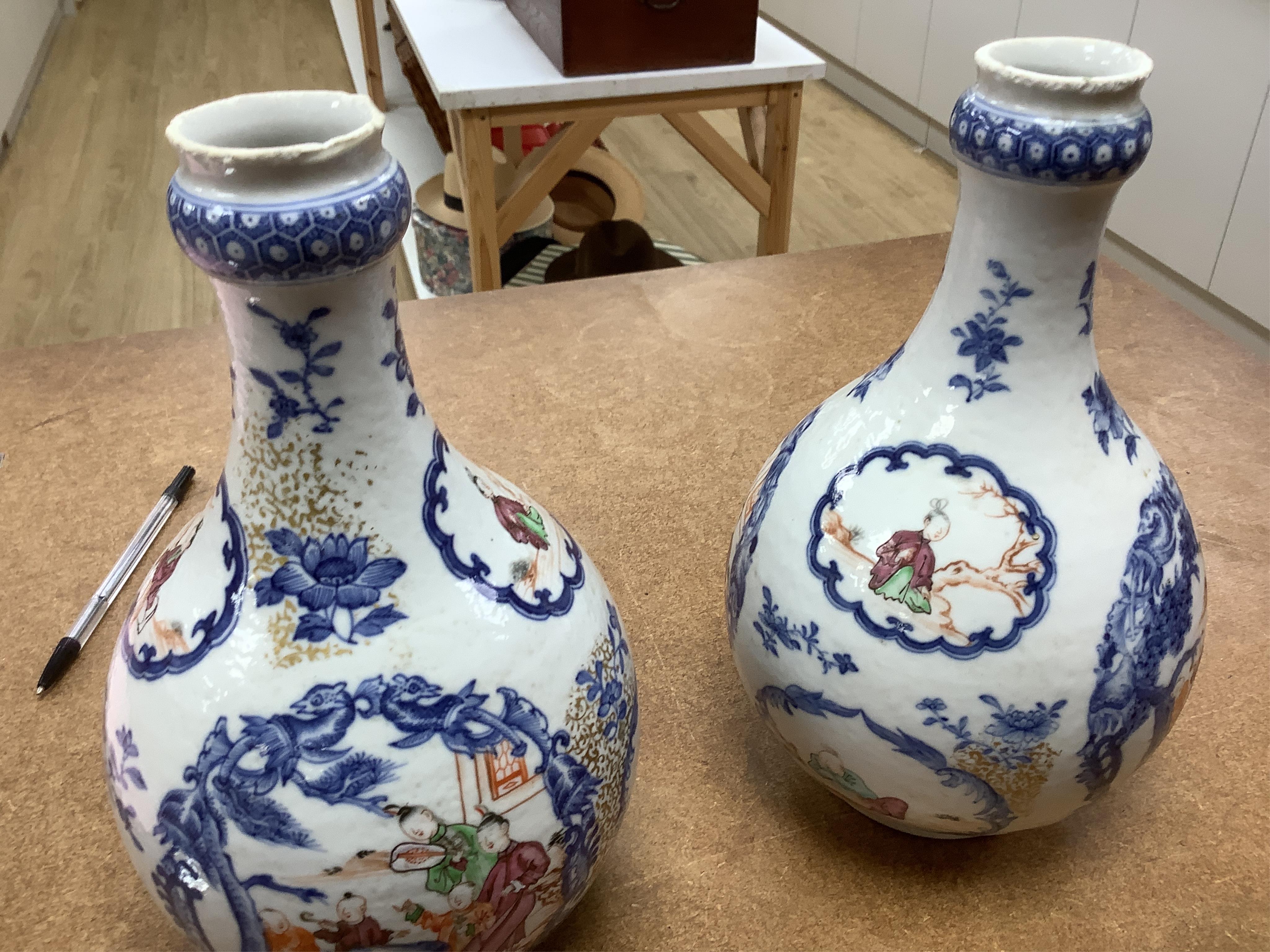 A pair of late 18th century Chinese export Mandarin guglets drilled, 24cm high